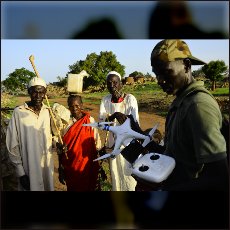 Halim during presentation of a drone to the curious villagers in Tamatingo.