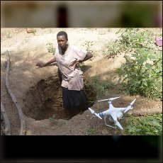 Our drone with Nuba Woman in a tipical fox-hole