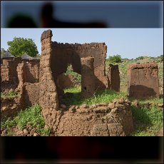 The ruins of Nuba traditional houses after the bombardment and the first rain.