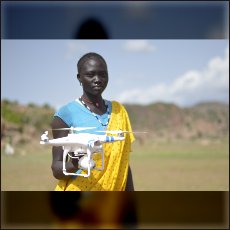 One of our drones in the hand of local girl.